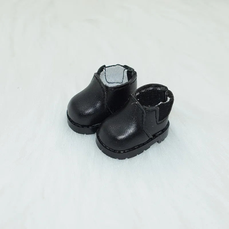 A pair of polyurethane doll shoe accessories for a 17cm figure, shown in a selected style and colour.