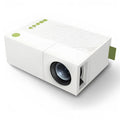 YG310 mini portable HD LED projector with front projection lens and compact black casing