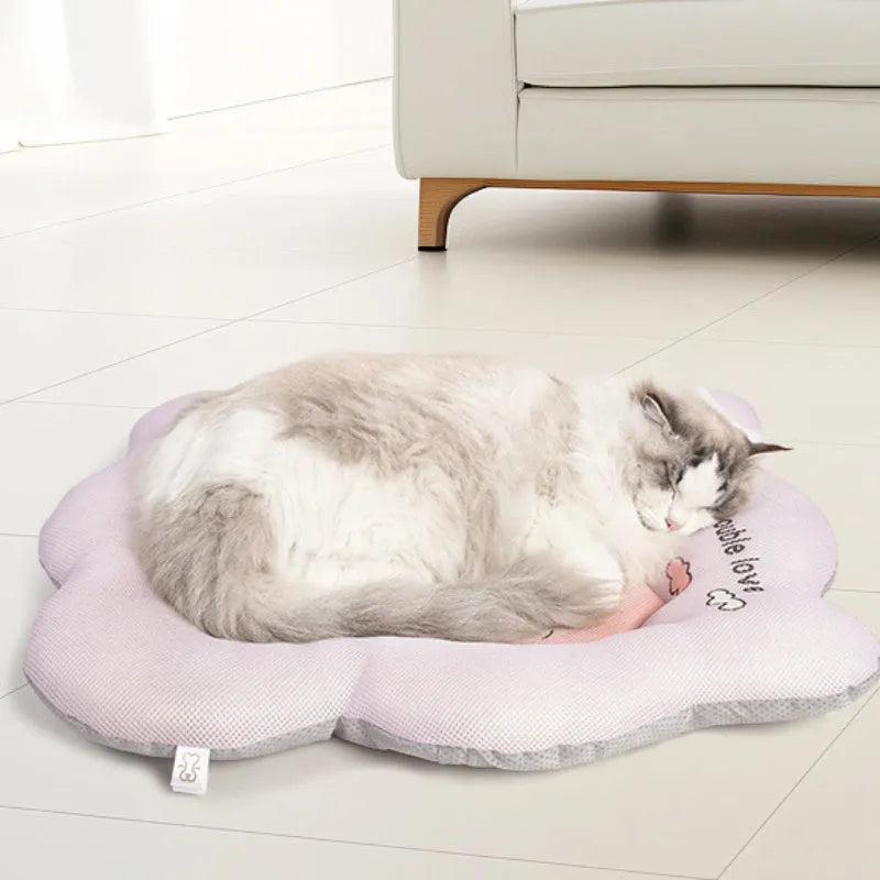 Green self-cooling gel pet mat for dogs and cats showing four available sizes.