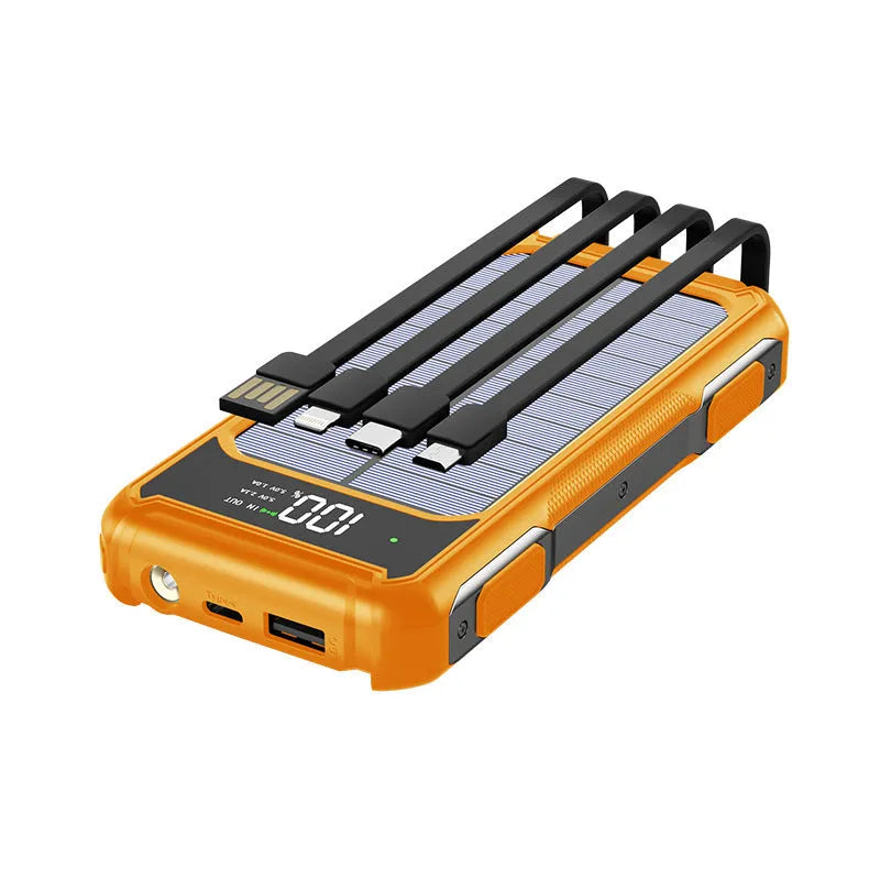Black, green, and orange military grade portable power bank showing compact size.