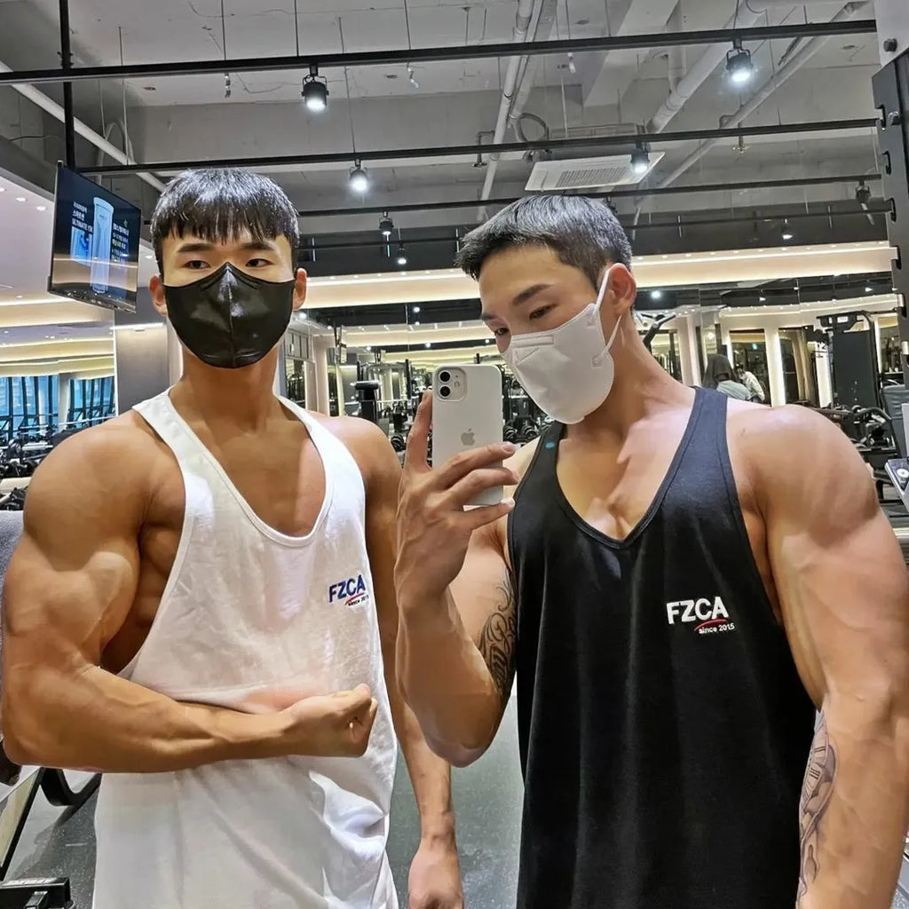 Men's cotton fitness vest in multiple colours for summer running and gym training.