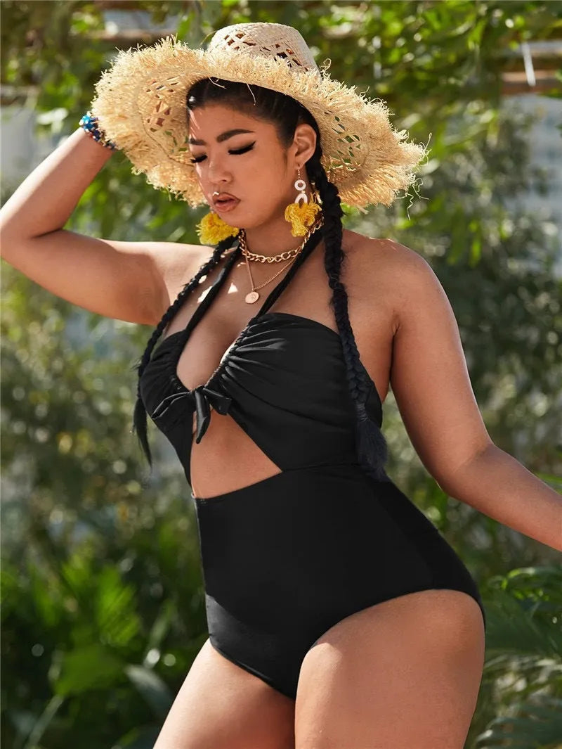 Plus size one-piece green tie-dye print swimsuit on display, made from polyester fibre for swimming and wading.