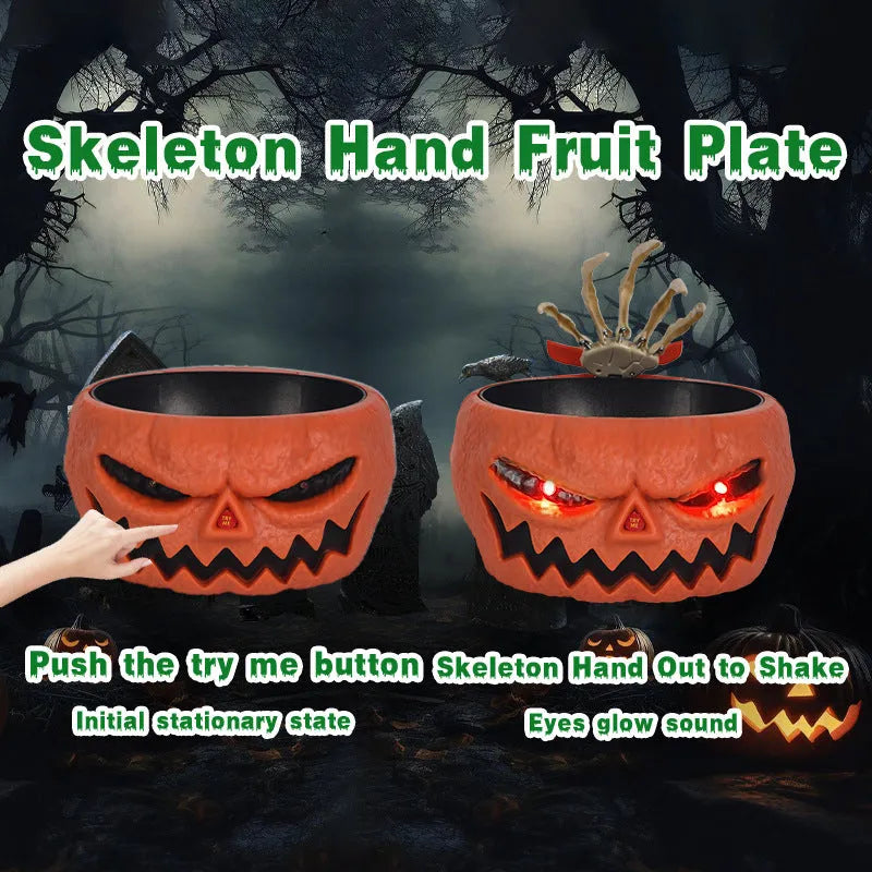 Motion activated Halloween candy bowl plastic pumpkin shape with skeleton hand and glowing red eyes