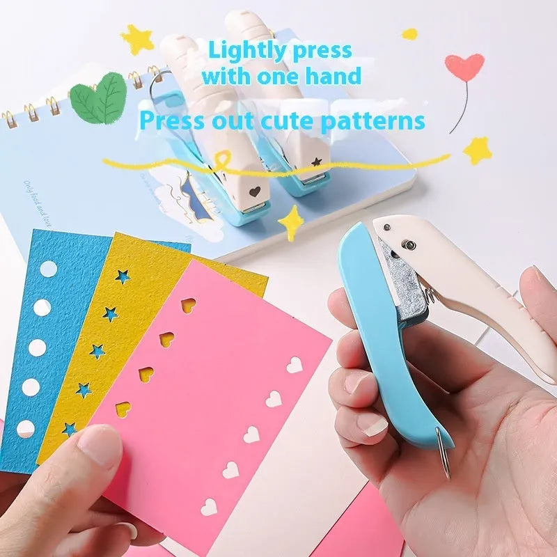 Manual hand-held punching machine for paper crafts with love, star, and round shape patterns.