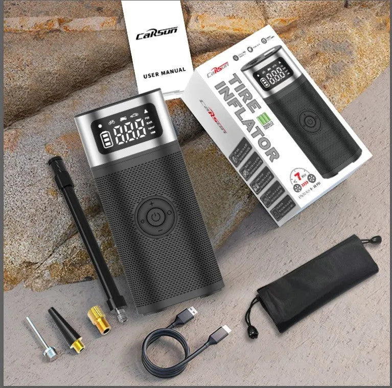 Black portable wireless smart air pump with LED light, USB cable, and nozzles for car, bike, ball, and swimming ring.