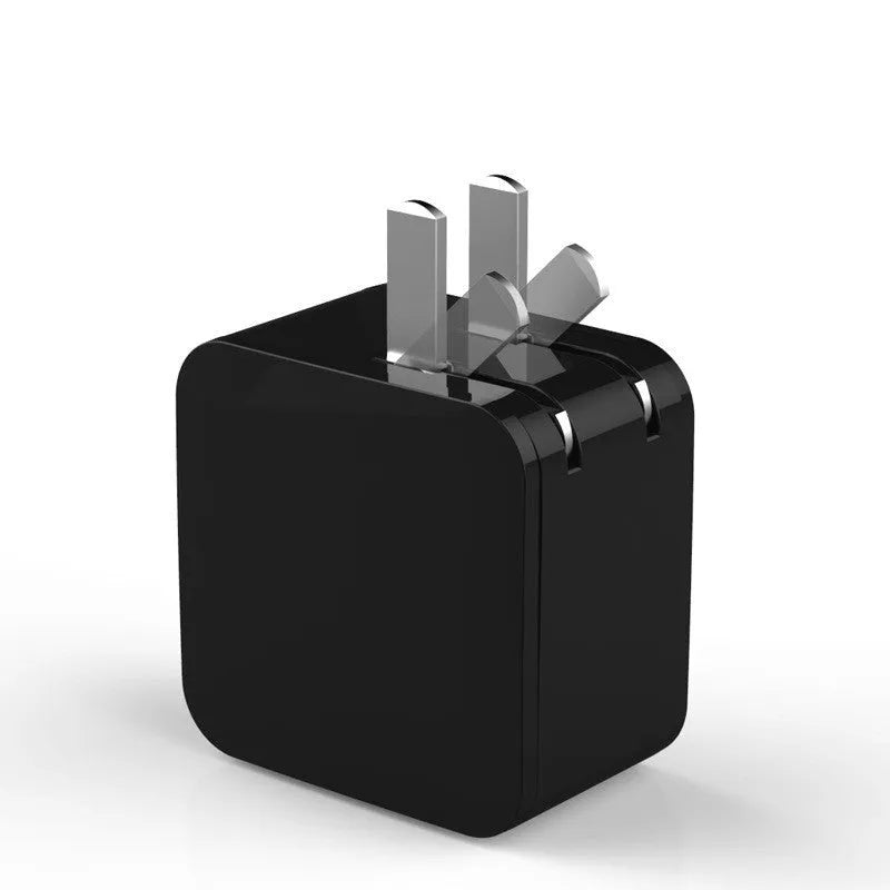 Black 5V2A dual USB wall charger with digital display screen, showing charging percentage, next to a UK 3-pin plug.