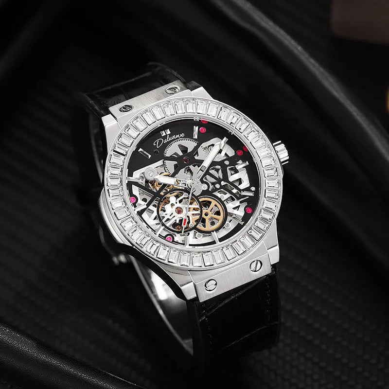 Men's automatic skeleton watch with diamond accents on a white metal case and strap.