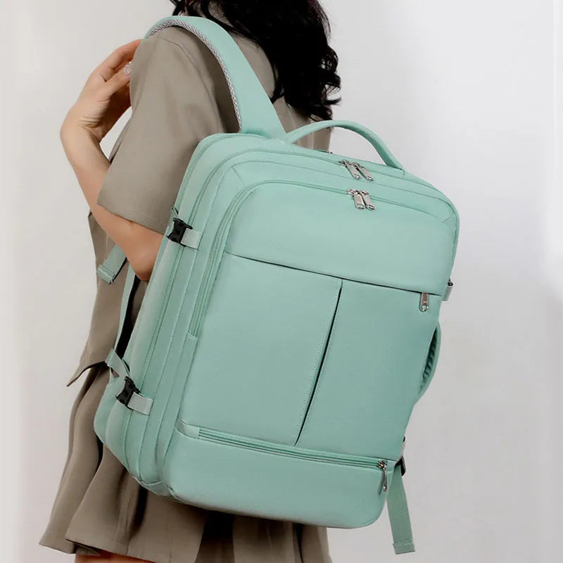 Large waterproof oxford cloth backpack for business travel with a 15.6 inch laptop compartment and multiple pockets.