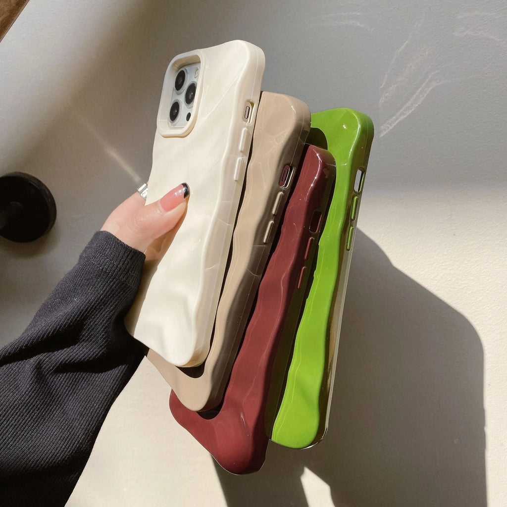 Soft wave-patterned TPU phone case for Apple iPhone 17 models in burgundy colour.