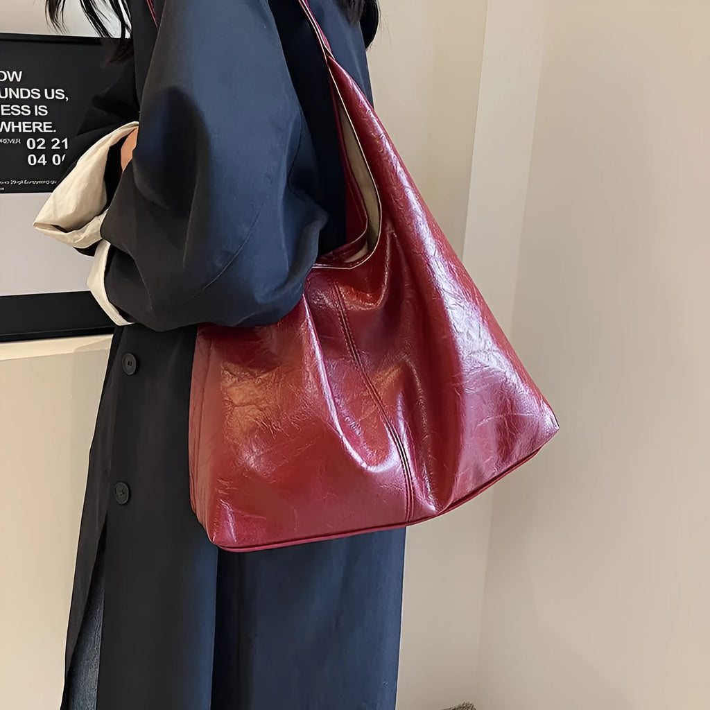 Soft PU leather large capacity shoulder bag in multiple colours with front sandwich pocket.