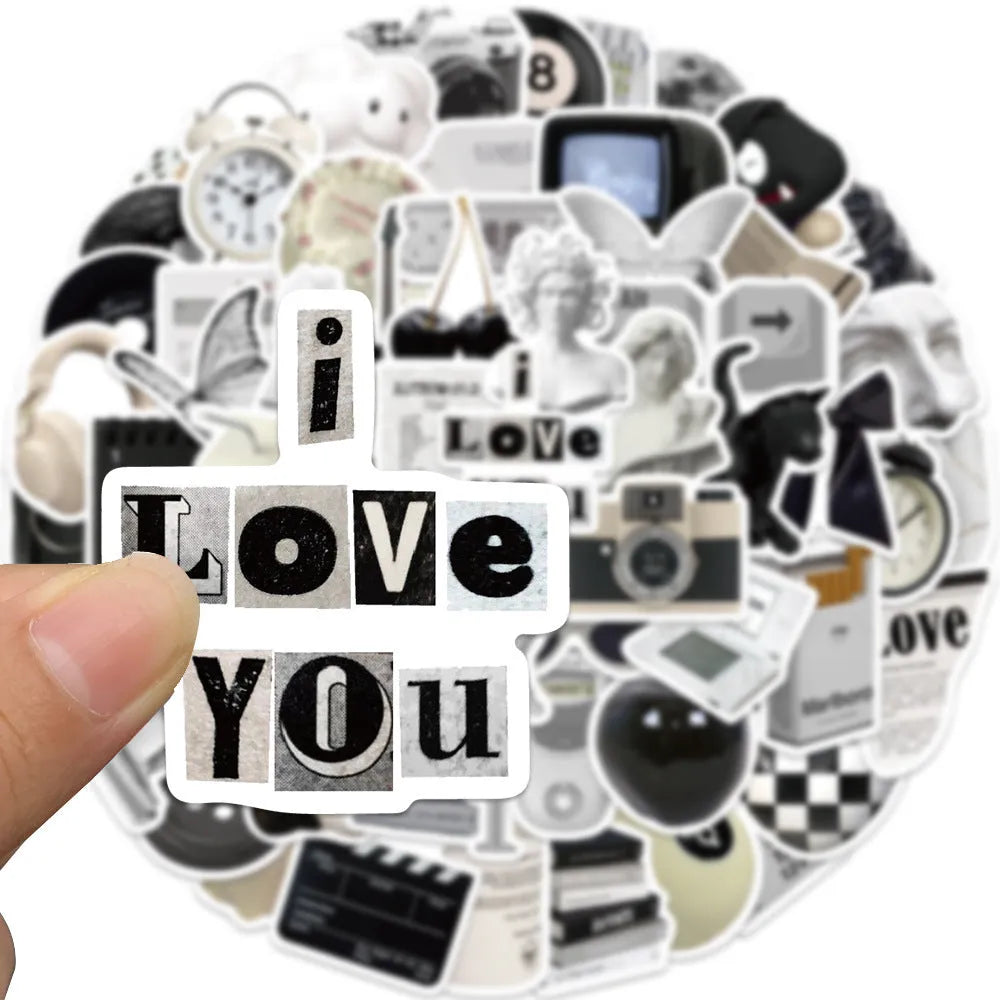 61-piece black and white waterproof PVC sticker set for laptops, phones, and cups.