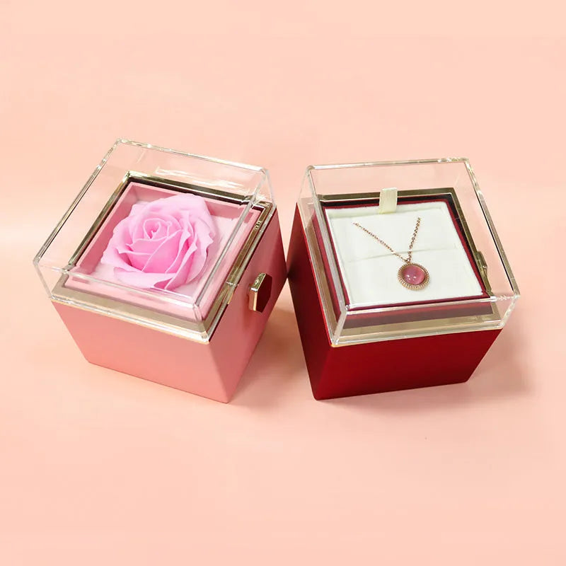 Rotating drawer jewellery gift box with red preserved rose under clear acrylic dome, showing open compartment.