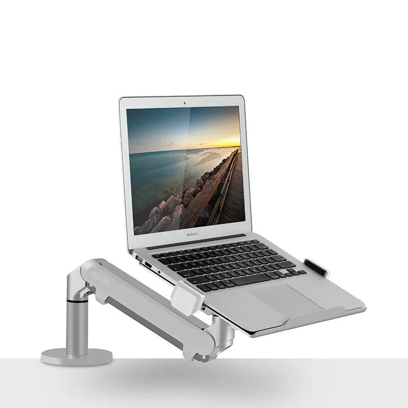 Silver aluminium free-standing laptop stand with extended telescopic arm holding a notebook.
