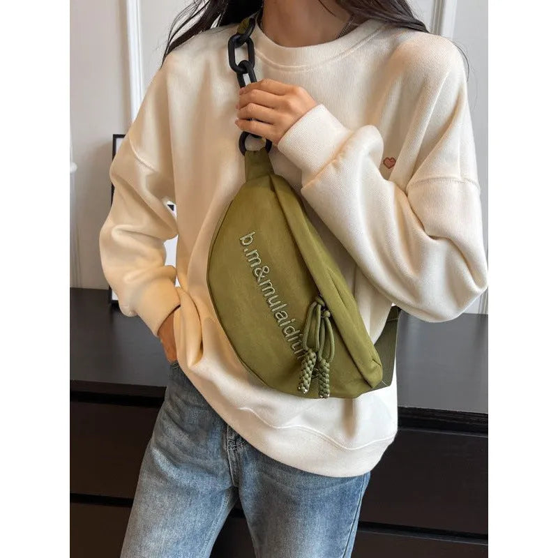 Women's nylon sports shoulder bag in beige with letter and embroidery details and chain accent