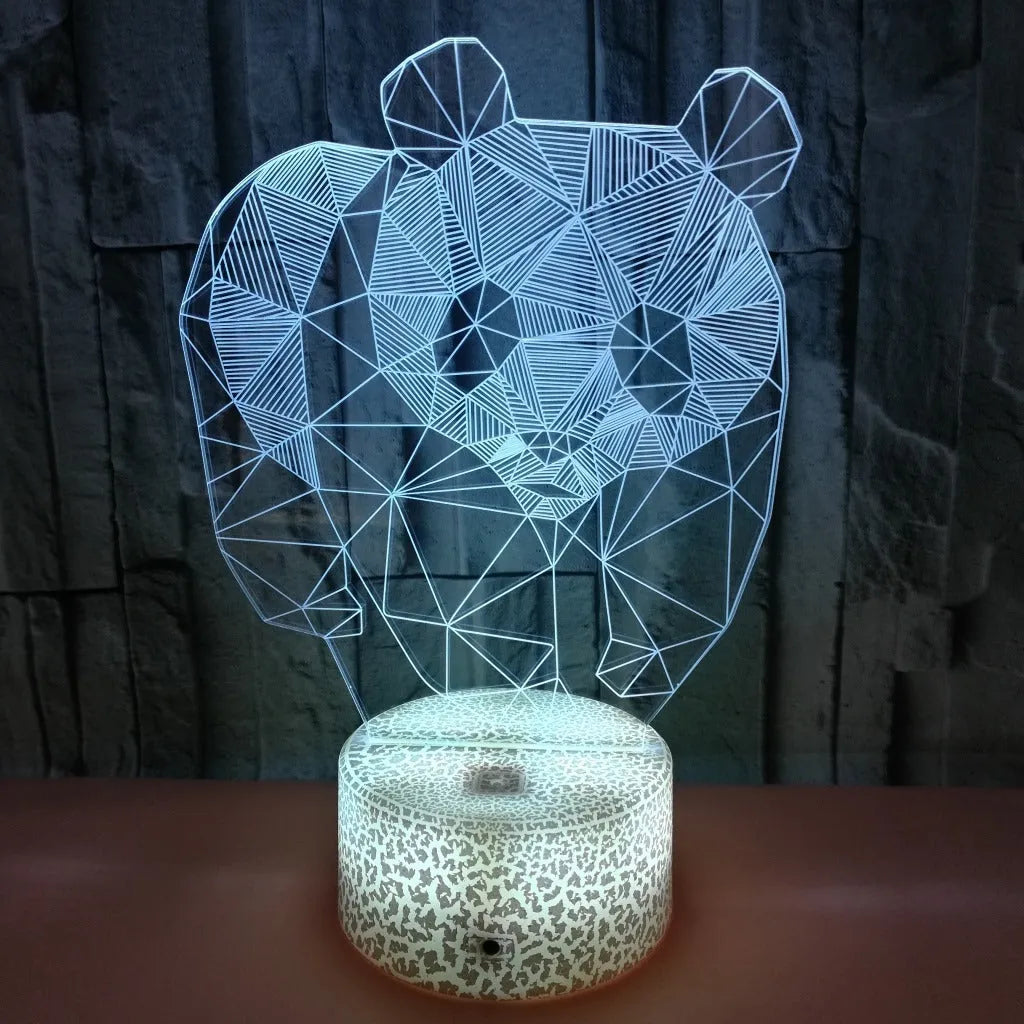 Panda colorful LED touch 3D night light with seven colour modes and remote control on a table
