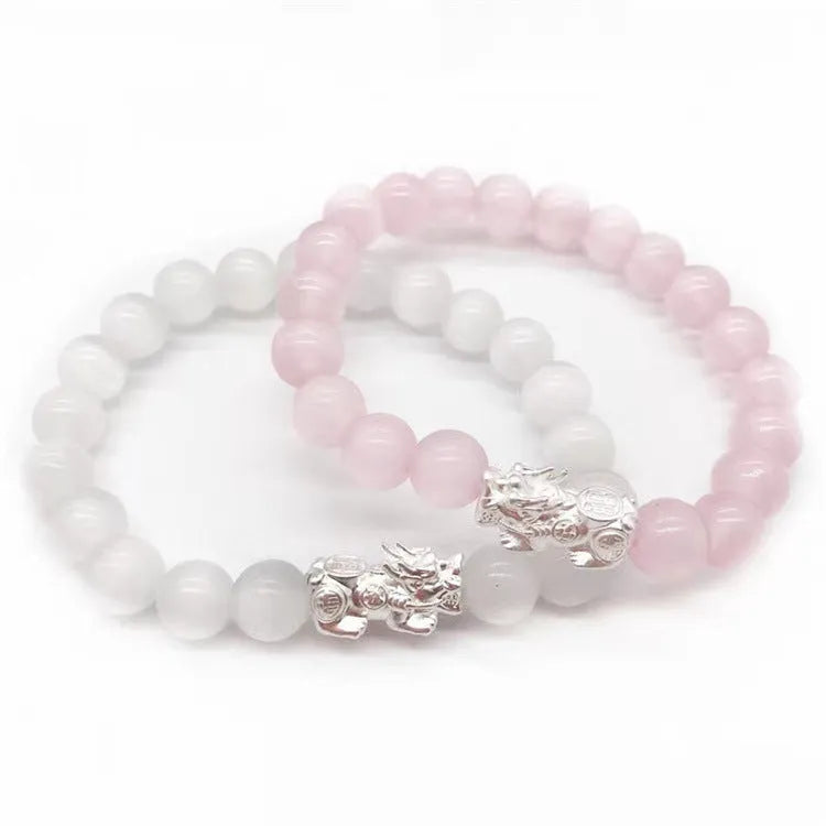 Natural crystal stone powder cat eye bracelet in pink, hand-woven with silver-coloured material, 260g