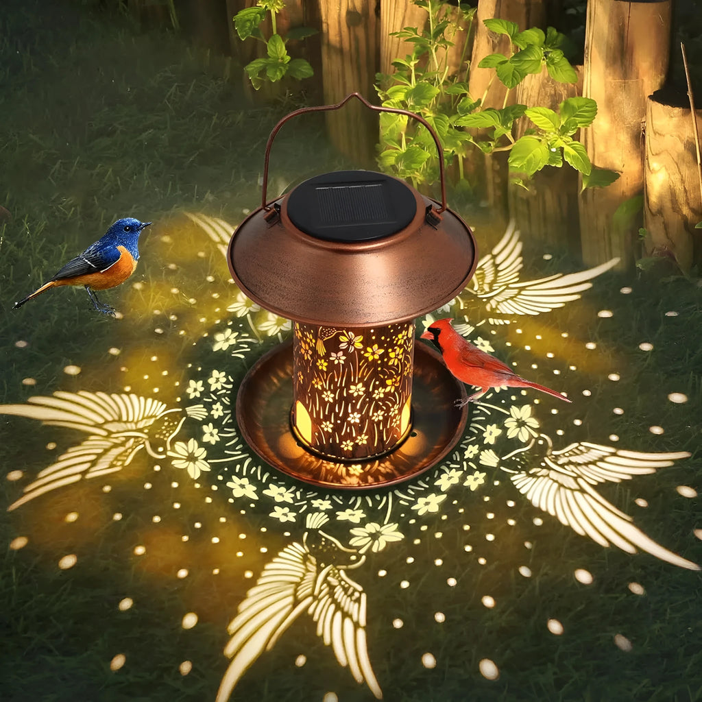 Solar-powered outdoor lamp and bird feeder with hummingbird pattern in iron art.