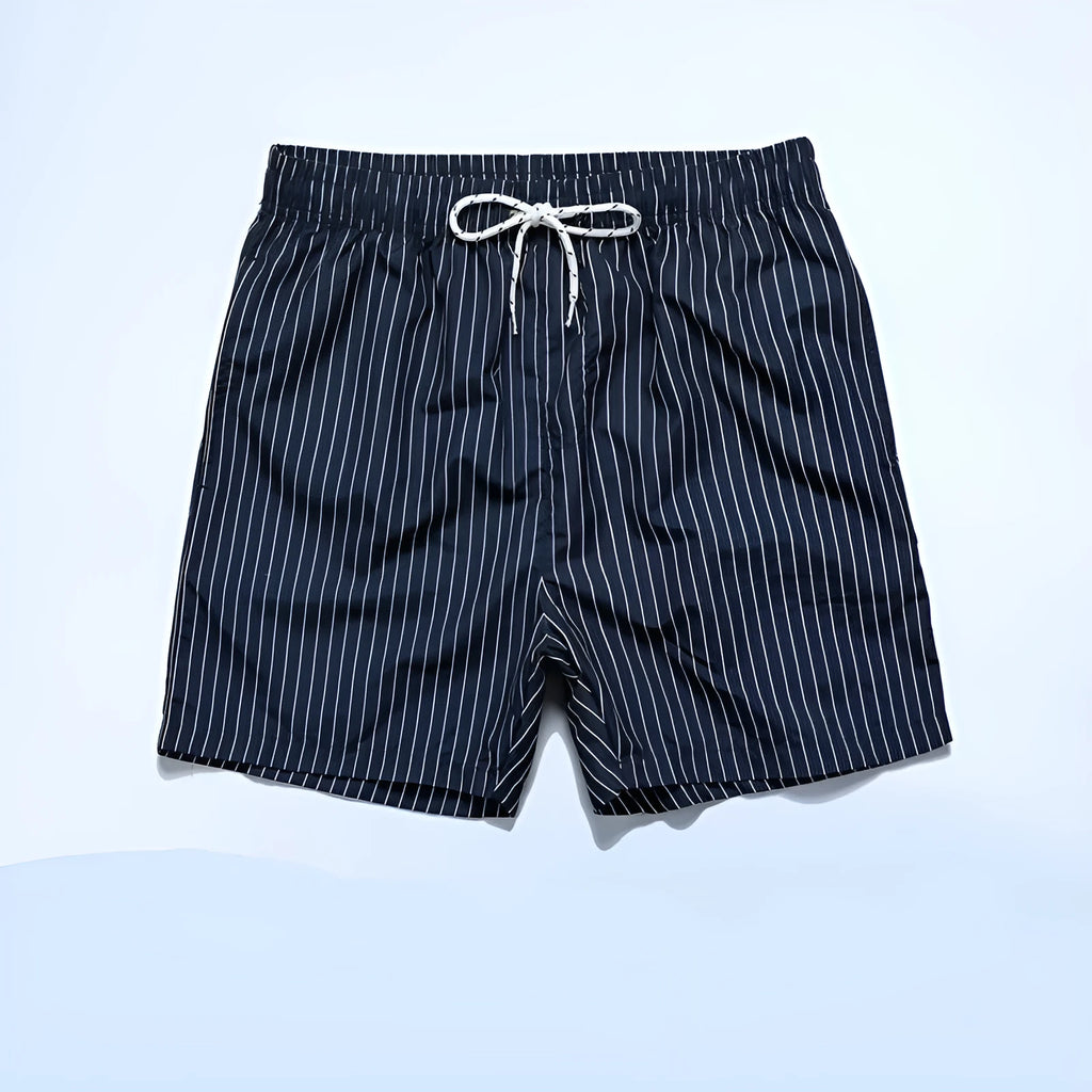 Polyester fibre beach shorts with striped triangle lining in straight leg design
