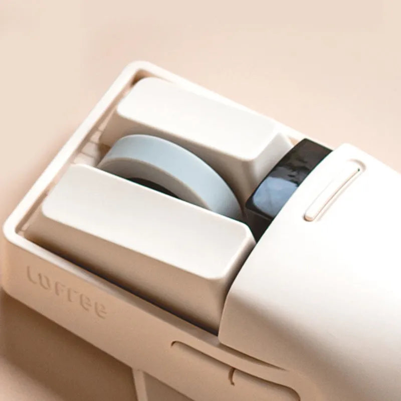 Xiaoqiao wireless mouse in tofu colour showing seven-button layout and Type-C charging port.