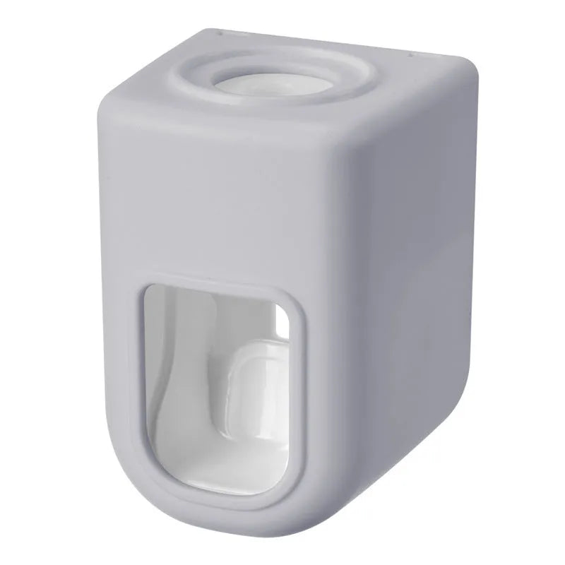 Nordic automatic toothpaste dispenser wall mounted in pink colour with compact 9x6x6cm design