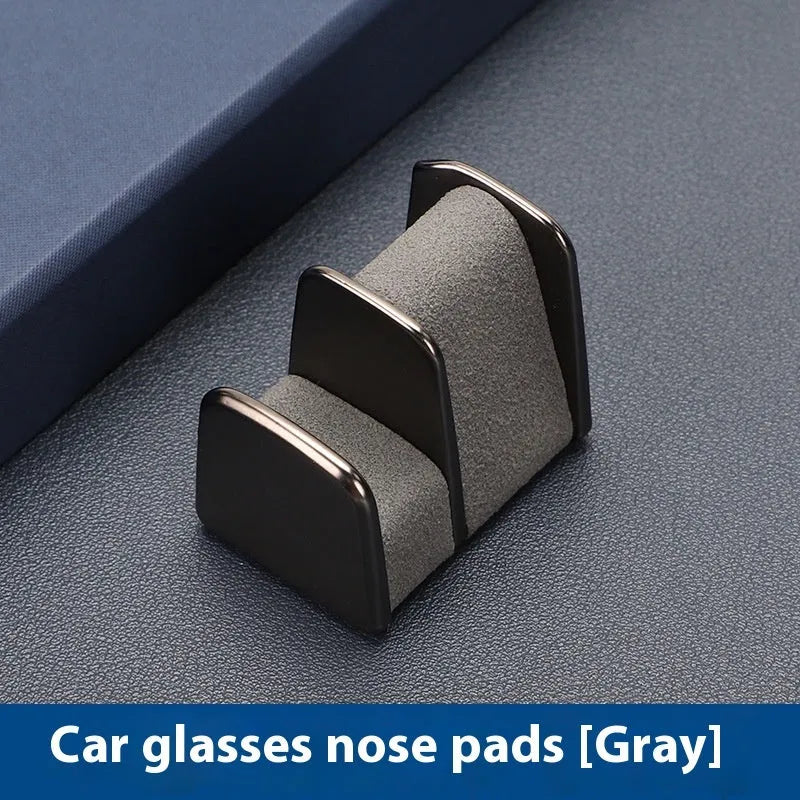 Zinc alloy car dashboard glasses clip holder in four colour options on vehicle dashboard