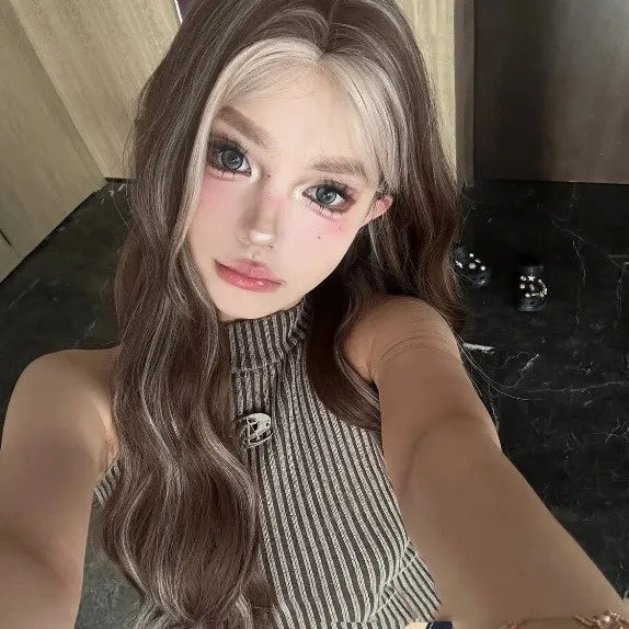 Long curly grey gold synthetic wig with lace front and highlights.