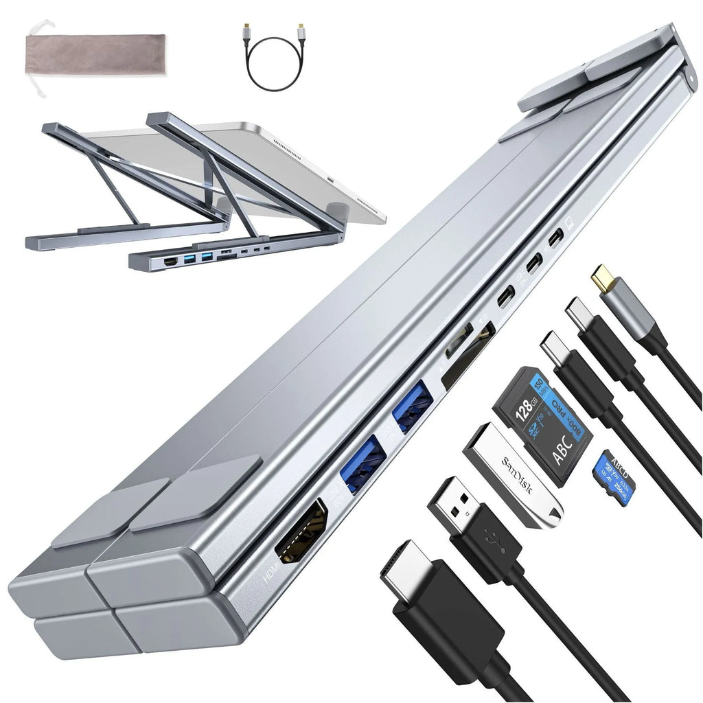 Silver aluminium foldable laptop stand with integrated multi-port docking station and a short connection cable.