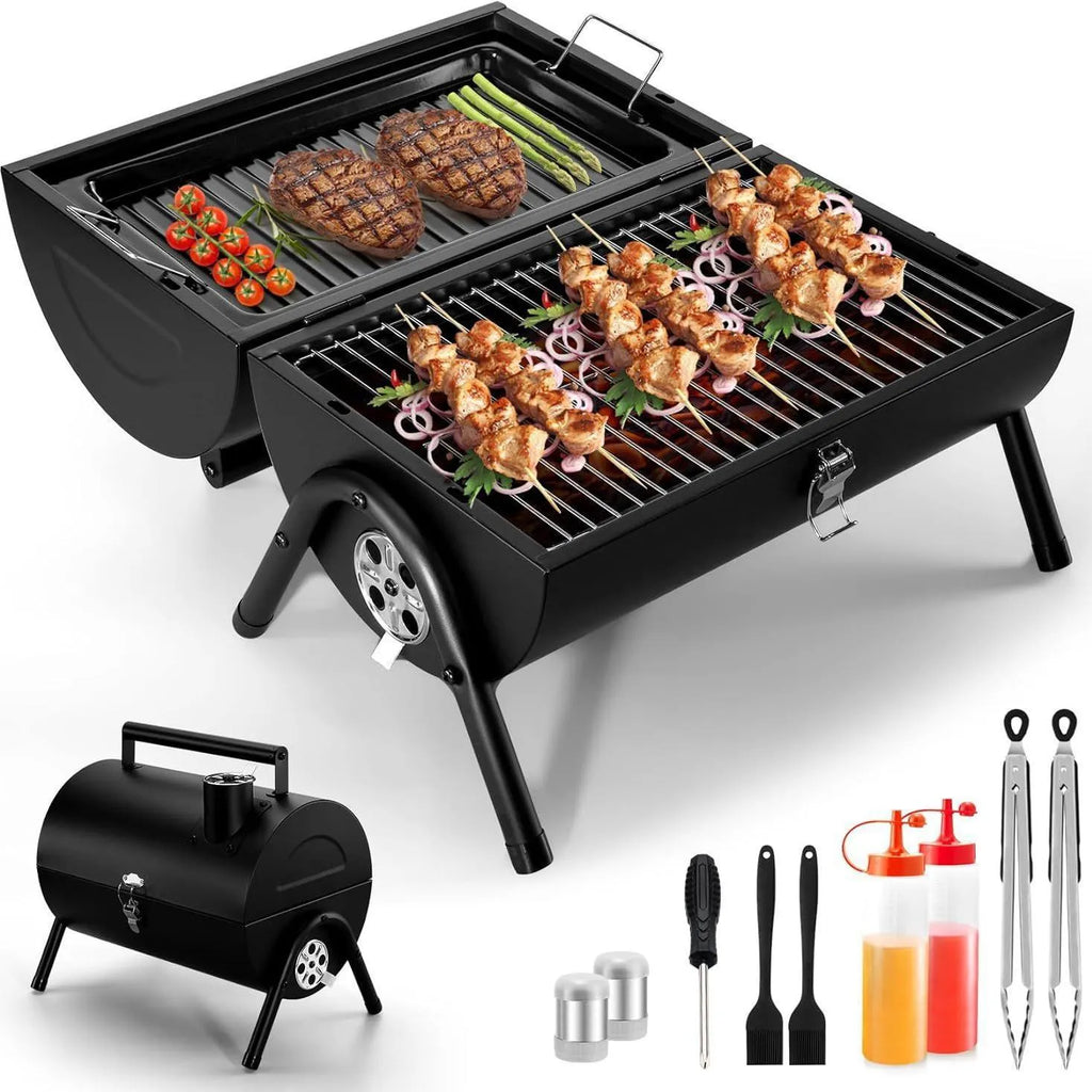 Small metal folding barbecue grill with charcoal fuel, shown on a tabletop.