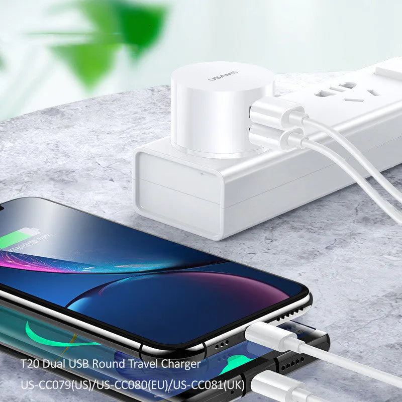 White portable universal dual USB phone charger with US EU UK plug compatibility and 39mm diameter