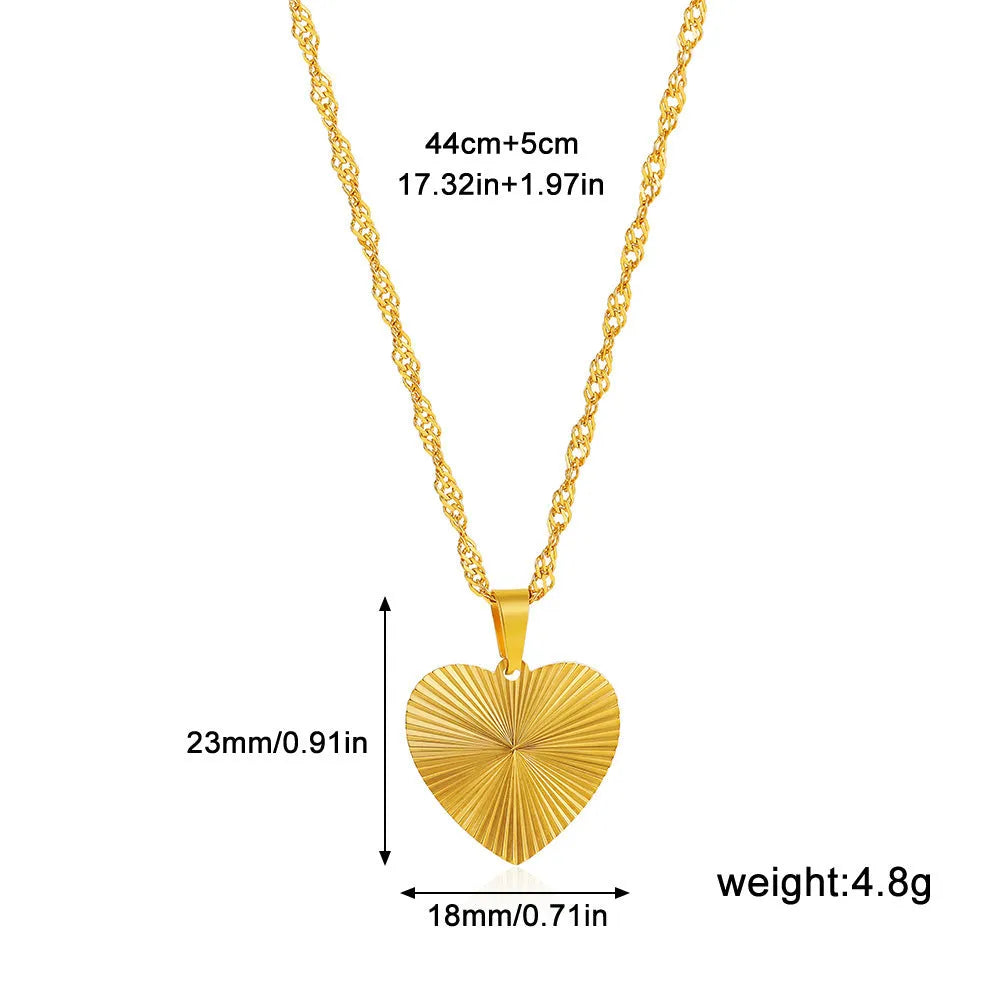18K gold plated necklace with water wave chain and a choice of heart, bow, round, or square butterfly pendant.