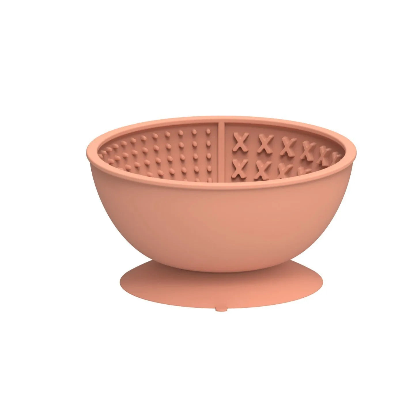 Cyan silicone dog bowl with textured slow-feed surface and a suction cup base on a kitchen floor.