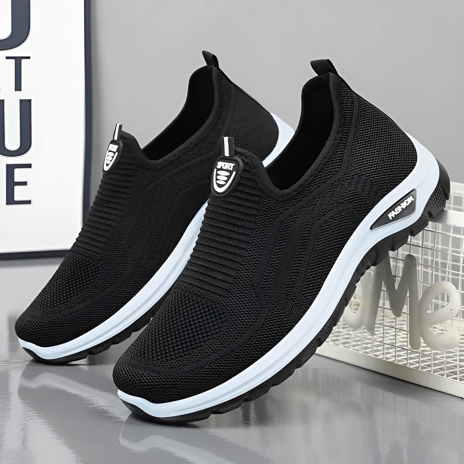 Men's black and grey breathable casual shoes with mesh lining, round toe, and PVC sole.