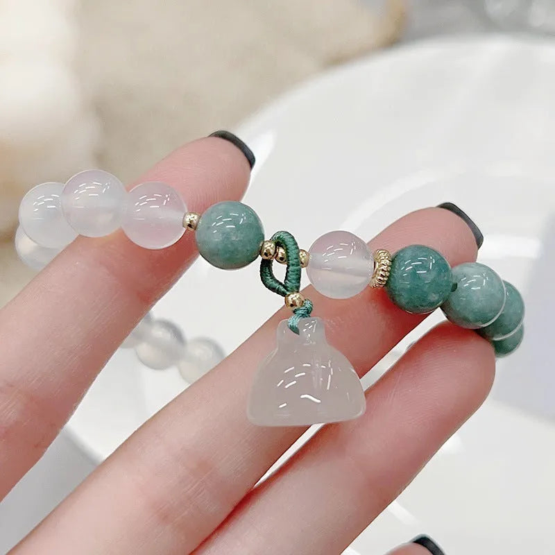 Women's agate bracelet with lotus seedpod design in retro Chinese style, adjustable fit