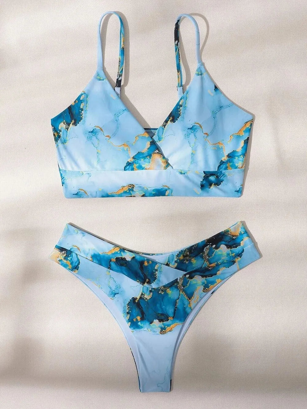Marble tie-dye print women's high-waisted U-neck bikini swimwear set on a neutral background.