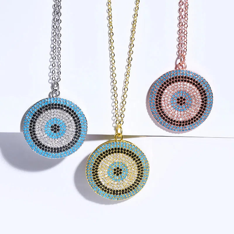 18K gold plated copper clavicle chain necklace with zircon pendant on display, gold finish, snake bone chain
