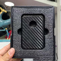 Black carbon fiber protective case for Apple Magsafe external battery with forged pattern finish