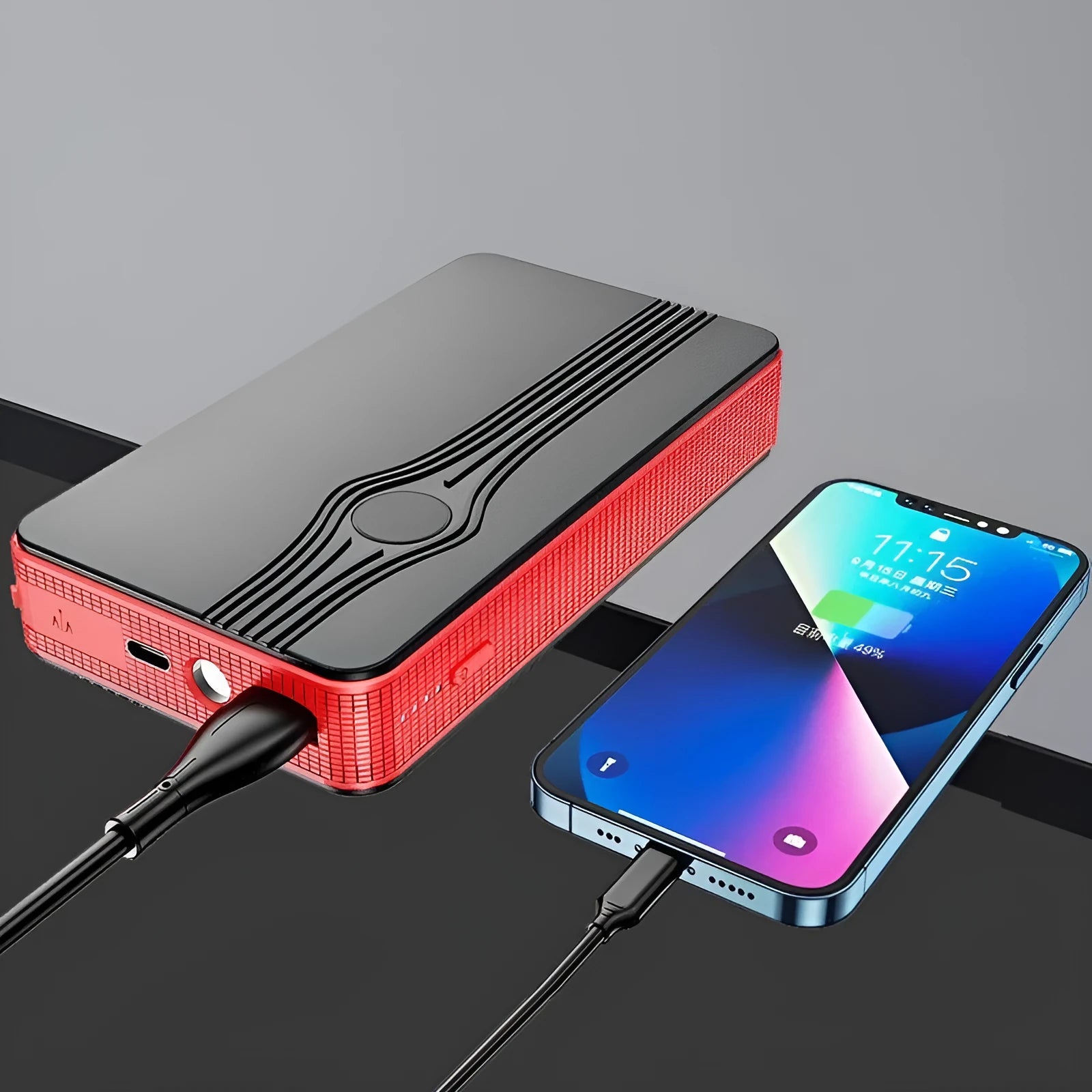 Red K4-E automobile emergency jump starter and portable power bank with USB port.