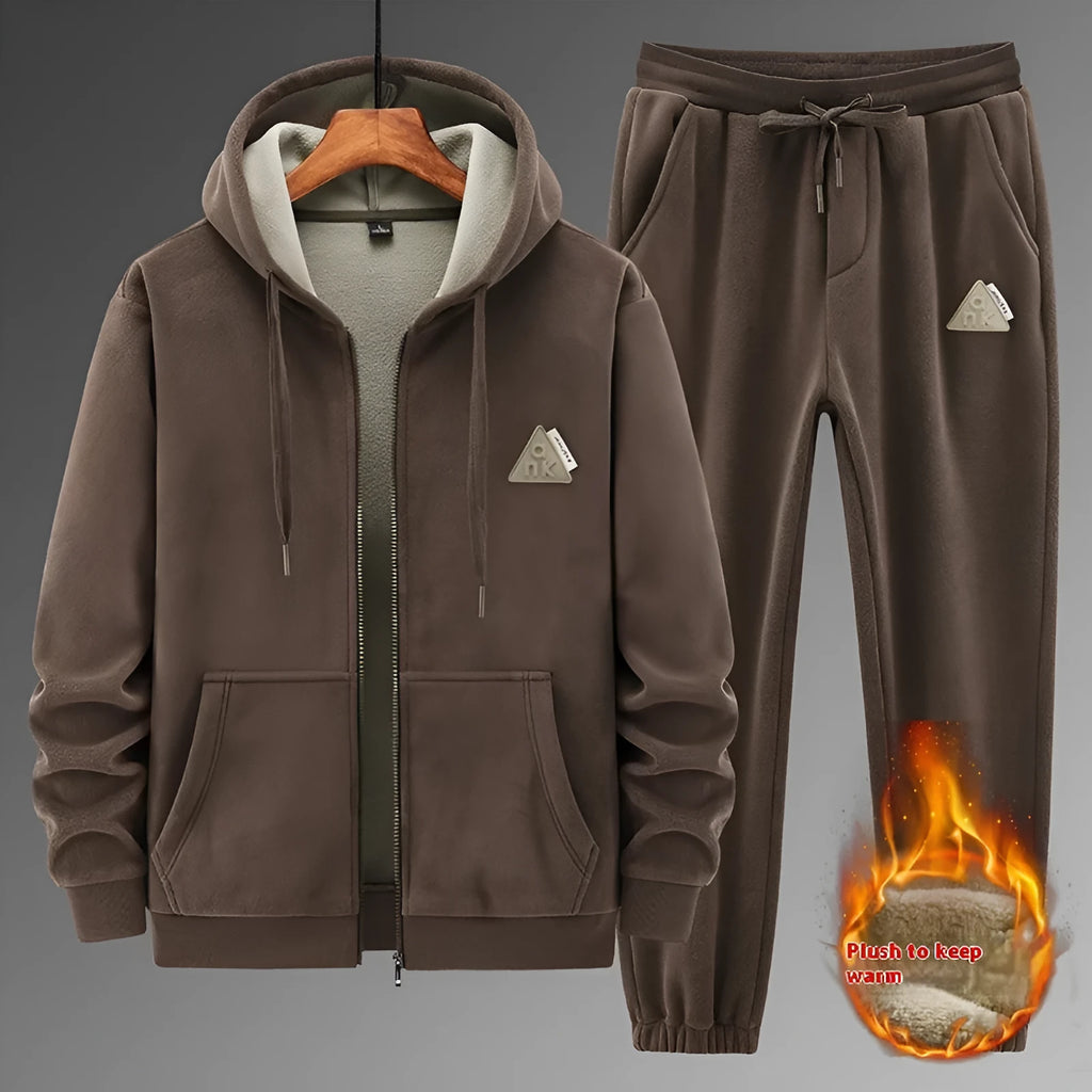 Grey cashmere-blend hooded sports jacket and matching full-length trousers laid flat.