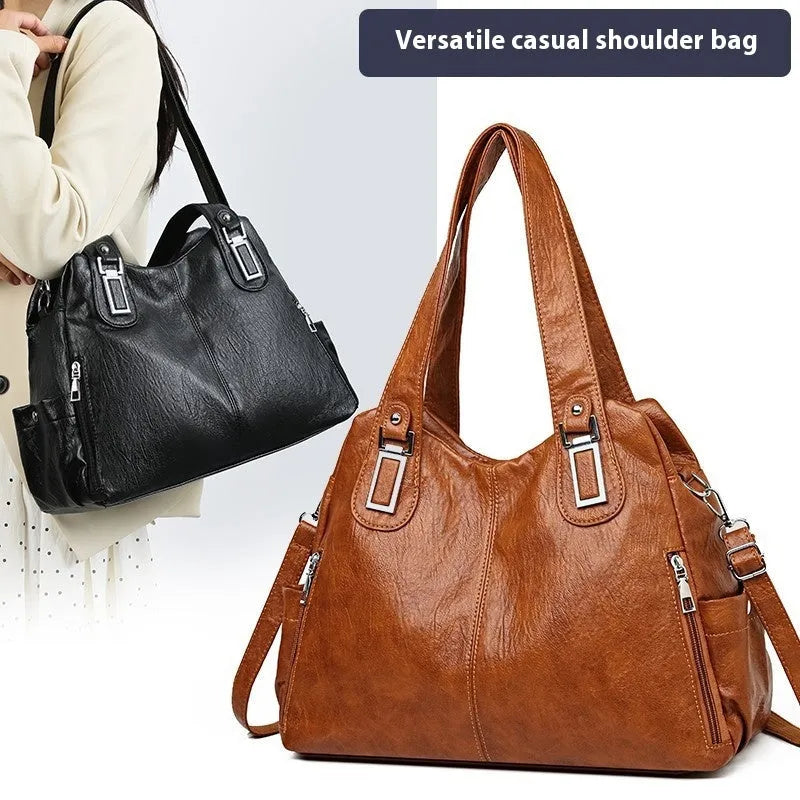 Soft square women's tote bag in various colours with a single shoulder strap and zip pocket inside.