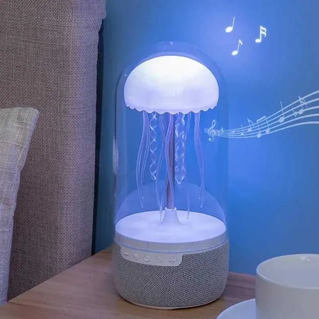 White 3-in-1 Bluetooth speaker jellyfish lamp with LED lights on a desk