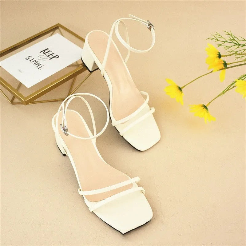 Beige women's square toe stiletto sandals with chunky heel and ankle buckle