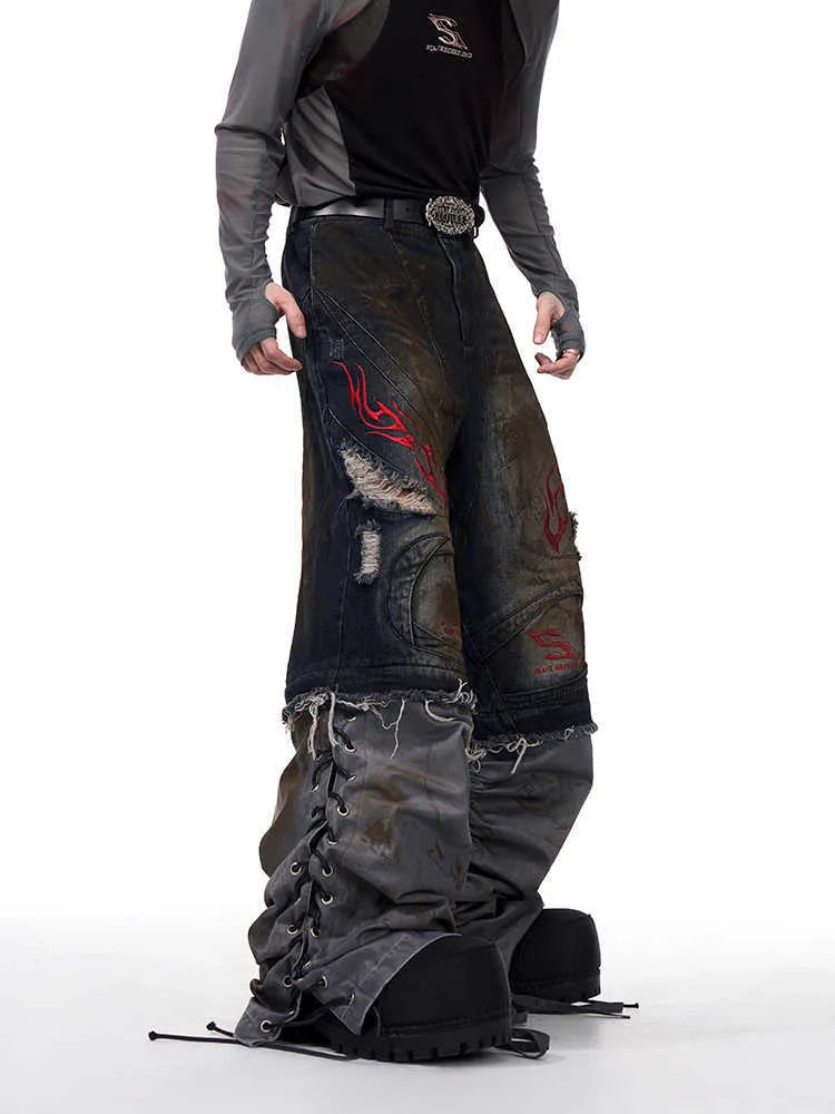 Men's loose fit retro jeans with detachable trouser legs in denim.