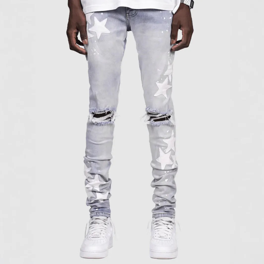 Men's slim stretch jeans in blue, grey, and light blue colours with embroidery detail