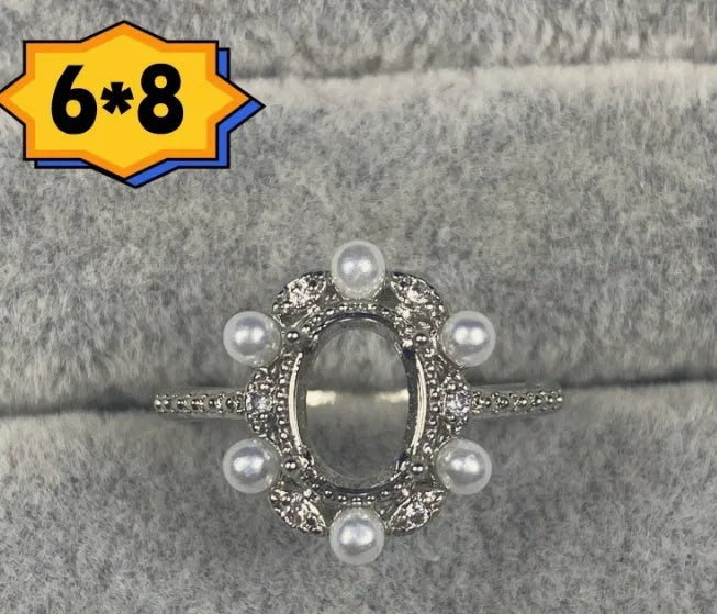Oval denier ring with open mouth design, 6*8 main stone, and five-pointed star detail in electroplated copper