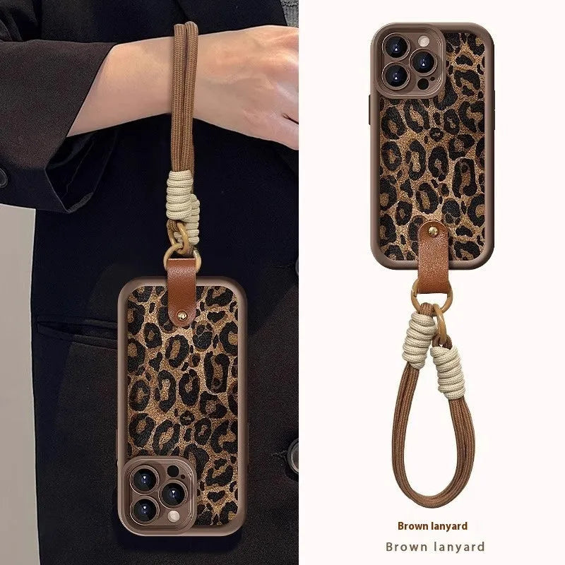 Brown leopard print silicone phone case with attached lanyard for iPhone models