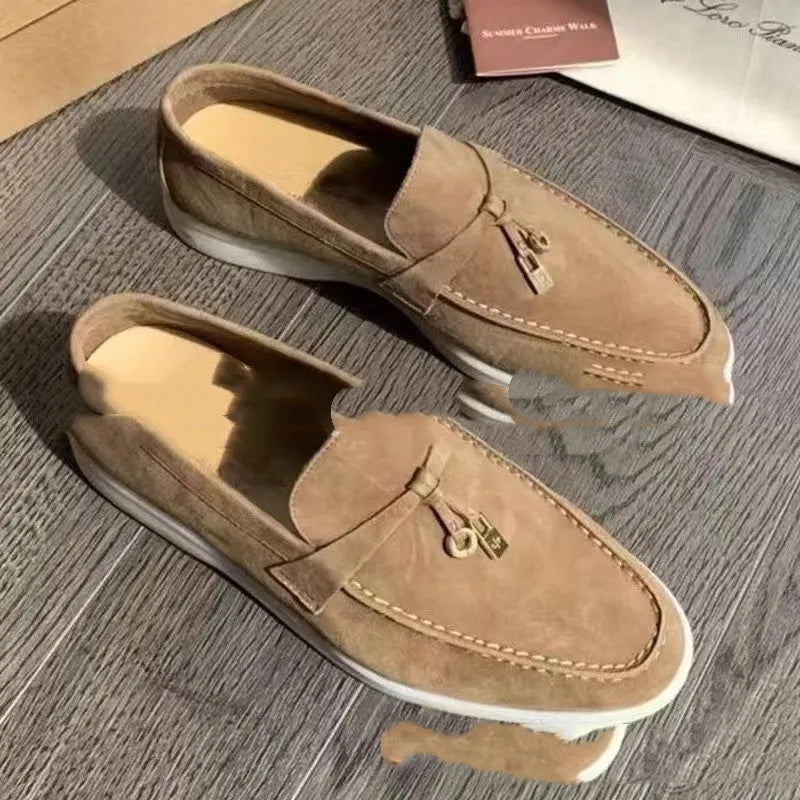 Lightweight unisex slip-on loafers with a round toe, rubber sole, and PU upper in a high-top design.