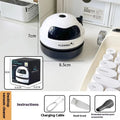 USB handheld desktop vacuum cleaner in blue, showing compact design for keyboard cleaning