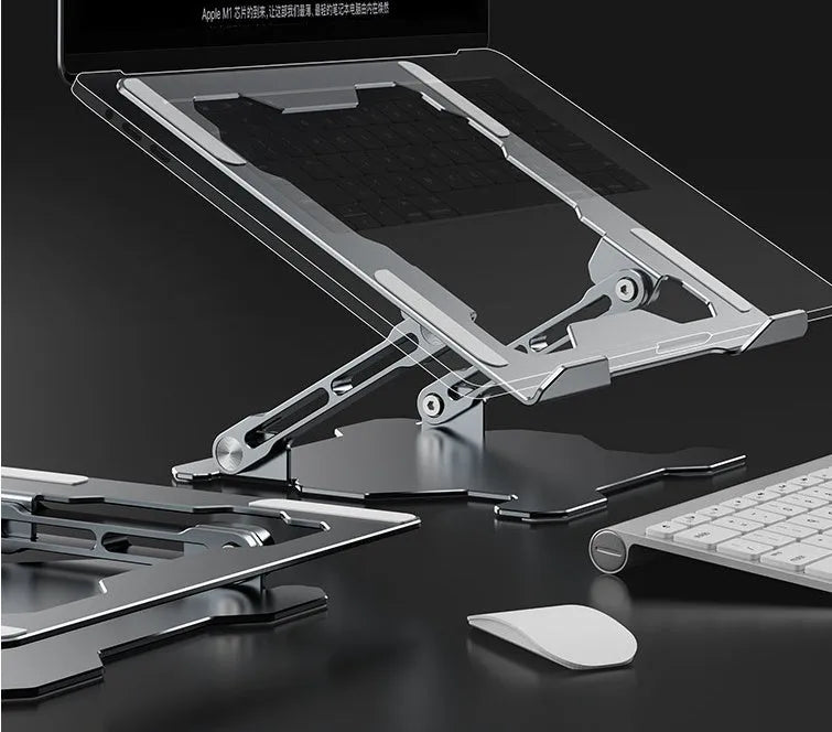 Grey portable aluminum laptop stand with adjustable angle, shown holding a silver laptop.