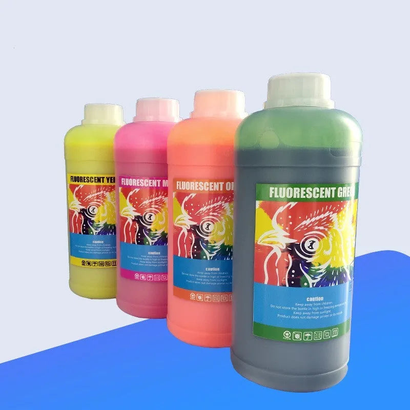 Fluorescent sublimation ink bottles in red, yellow, orange and green colours for heat transfer printing