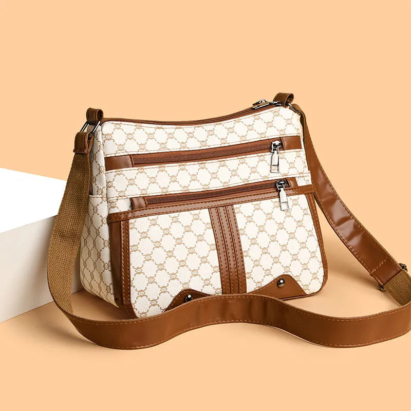 Brown women's large crossbody bag with stitching pattern on PU leather.